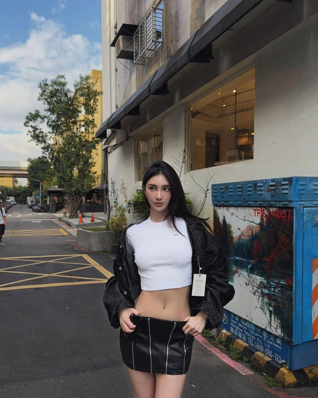 White crop top with black jacket and miniskirt picture 1 of 1