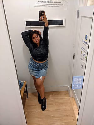 Filipina baddie in a mini skirt'