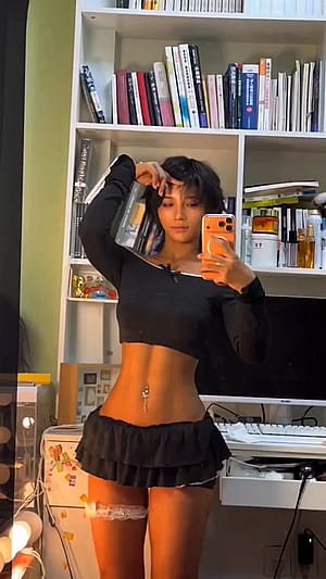 Zhuzhu Zai looking cute in her home office'